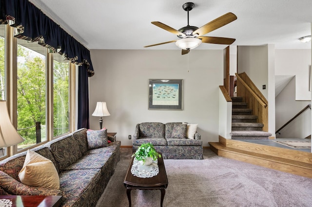 11946 180th St, Milaca Twp, MN 56353 - carpeted living area featuring a ceiling fan, stairs, and baseboards