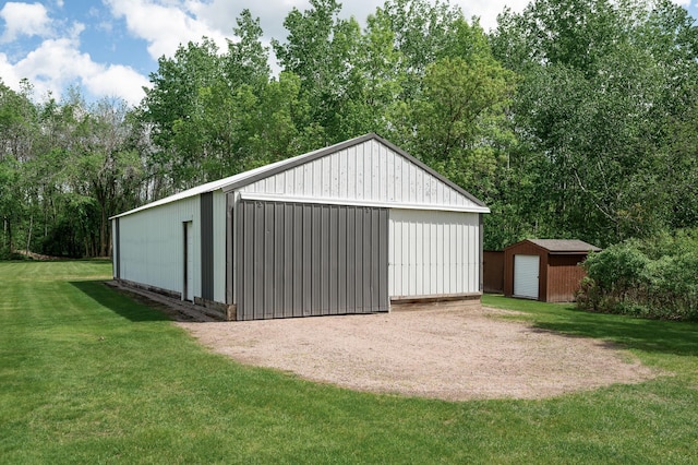 11946 180th St, Milaca Twp, MN 56353 - detached garage with view of scattered trees