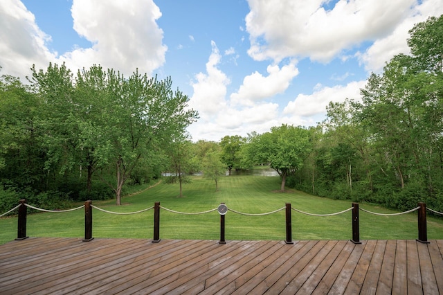11946 180th St, Milaca Twp, MN 56353 - wooden deck featuring a lawn
