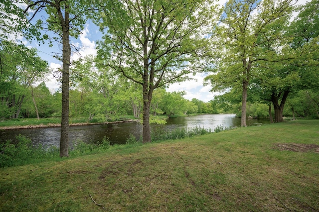 11946 180th St, Milaca Twp, MN 56353 - view of grassy yard featuring a water view