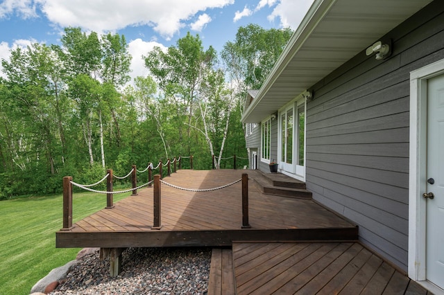 11946 180th St, Milaca Twp, MN 56353 - wooden deck featuring a yard and french doors