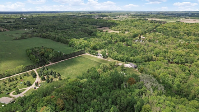 11946 180th St, Milaca Twp, MN 56353 - aerial view of property and surrounding area featuring a heavily wooded area