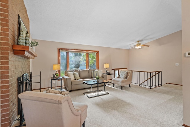 3225 Hillsboro Ave N, New Hope, MN 55427 - living area featuring a brick fireplace, ceiling fan, and carpet flooring