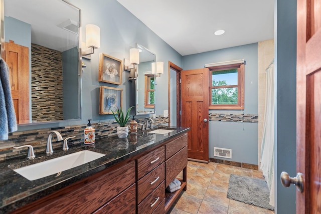 3225 Hillsboro Ave N, New Hope, MN 55427 - full bathroom with backsplash and double vanity