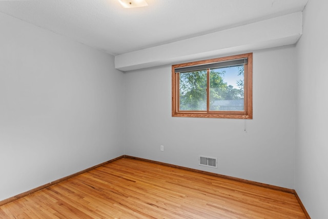 3225 Hillsboro Ave N, New Hope, MN 55427 - spare room featuring baseboards and light wood finished floors