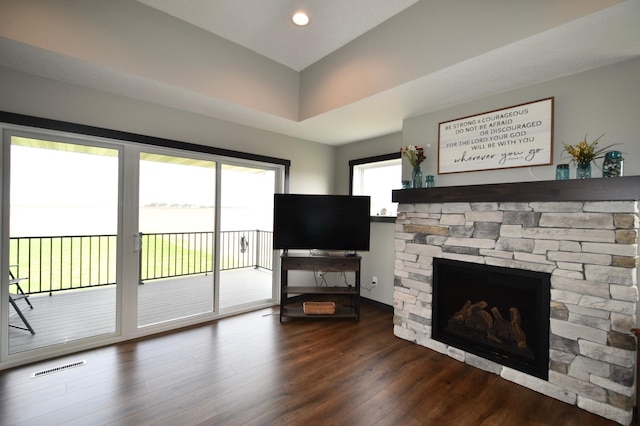 1800 20th Avenue Cir NE, Kasson, MN 55944 - unfurnished living room featuring a stone fireplace, wood finished floors, and recessed lighting
