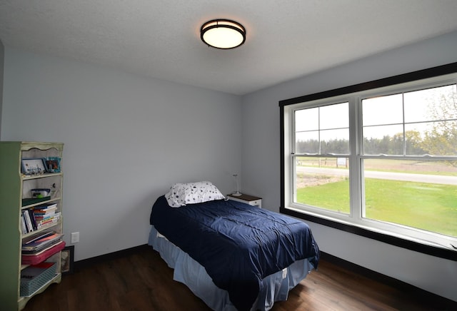 1800 20th Avenue Cir NE, Kasson, MN 55944 - bedroom featuring wood finished floors and baseboards