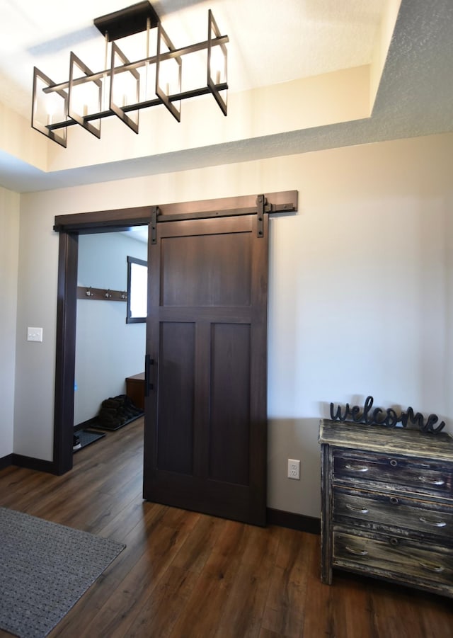 1800 20th Avenue Cir NE, Kasson, MN 55944 - entrance foyer with baseboards, dark wood-style floors, and a barn door