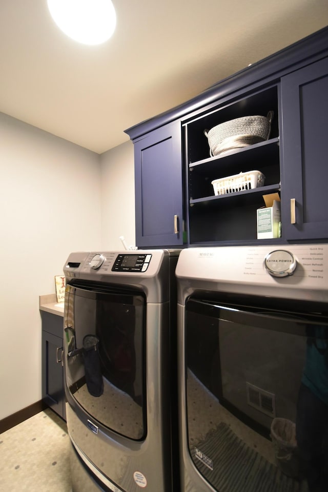 1800 20th Avenue Cir NE, Kasson, MN 55944 - laundry area with cabinet space, washing machine and dryer, and baseboards