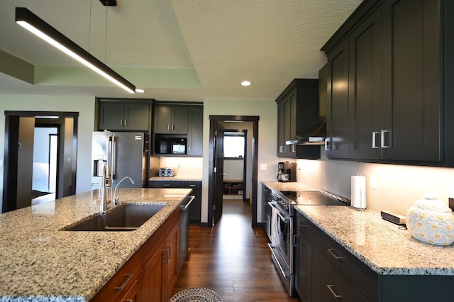 1800 20th Avenue Cir NE, Kasson, MN 55944 - kitchen with appliances with stainless steel finishes, a sink, dark wood finished floors, wall chimney exhaust hood, and light stone counters