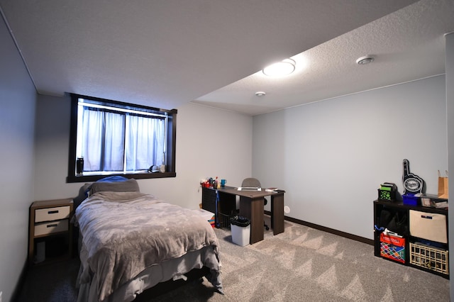 1800 20th Avenue Cir NE, Kasson, MN 55944 - carpeted bedroom featuring a textured ceiling and baseboards