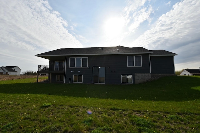 1800 20th Avenue Cir NE, Kasson, MN 55944 - rear view of property featuring a lawn and a deck