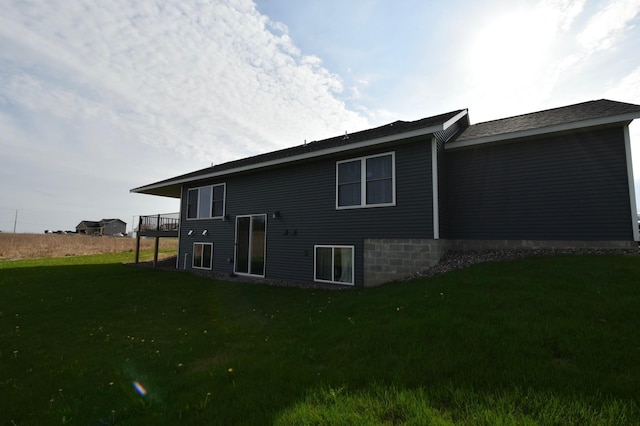 1800 20th Avenue Cir NE, Kasson, MN 55944 - rear view of property with a lawn and a deck