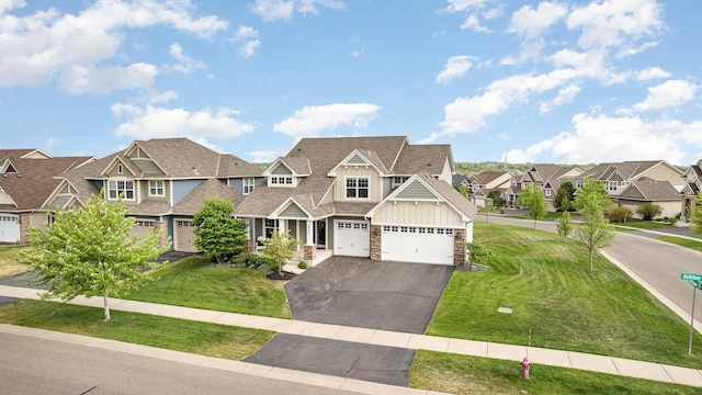 4740 Ashton Curv, Woodbury, MN 55129 - view of front of home with a residential view, board and batten siding, asphalt driveway, roof with shingles, and a front lawn