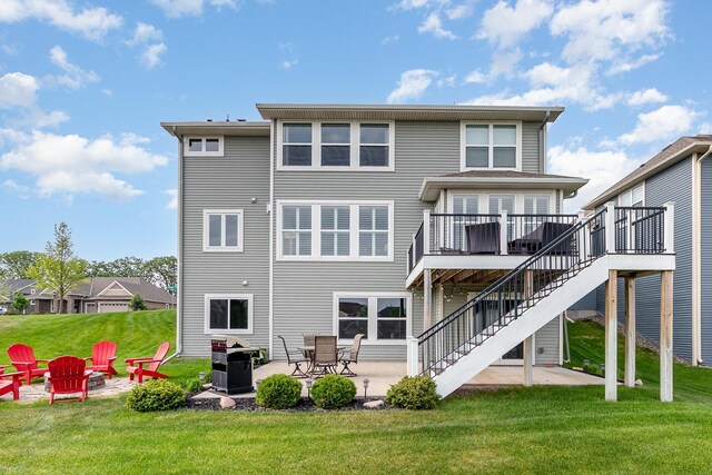 4740 Ashton Curv, Woodbury, MN 55129 - back of house featuring stairs, a deck, a patio area, a yard, and an outdoor fire pit