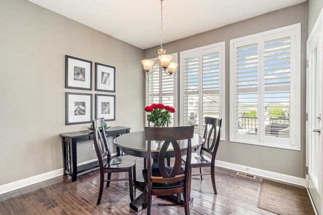 4740 Ashton Curv, Woodbury, MN 55129 - dining space with dark wood-type flooring, baseboards, and plenty of natural light