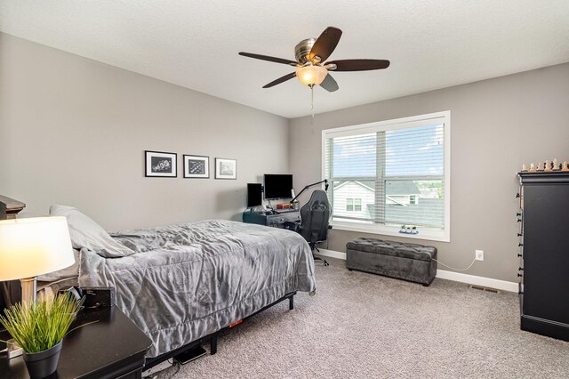 4740 Ashton Curv, Woodbury, MN 55129 - bedroom featuring baseboards, carpet floors, and a ceiling fan