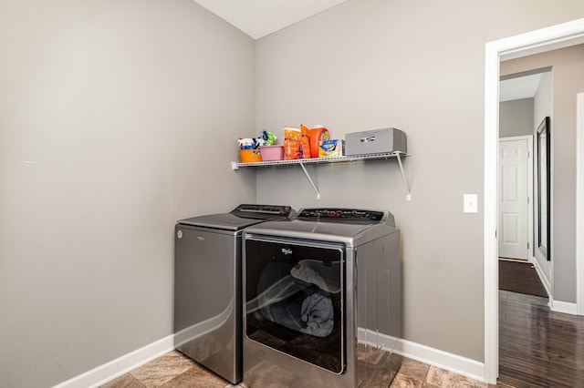 4740 Ashton Curv, Woodbury, MN 55129 - laundry area with washing machine and dryer and baseboards
