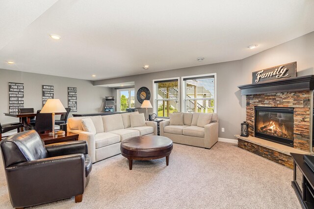 4740 Ashton Curv, Woodbury, MN 55129 - living room with carpet flooring, a stone fireplace, recessed lighting, and baseboards
