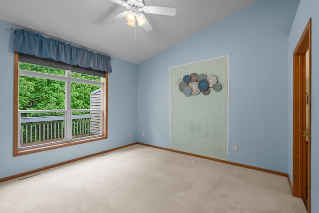 13403 96th Pl N, Maple Grove, MN 55369 - unfurnished room with carpet floors, vaulted ceiling, baseboards, and a ceiling fan