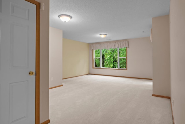 13403 96th Pl N, Maple Grove, MN 55369 - carpeted spare room with baseboards and a textured ceiling