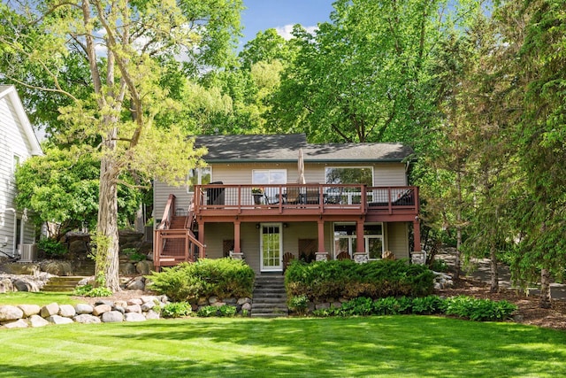 3806 Sunset Dr, Spring Park, MN 55384 - rear view of house with stairway, a wooden deck, and a lawn