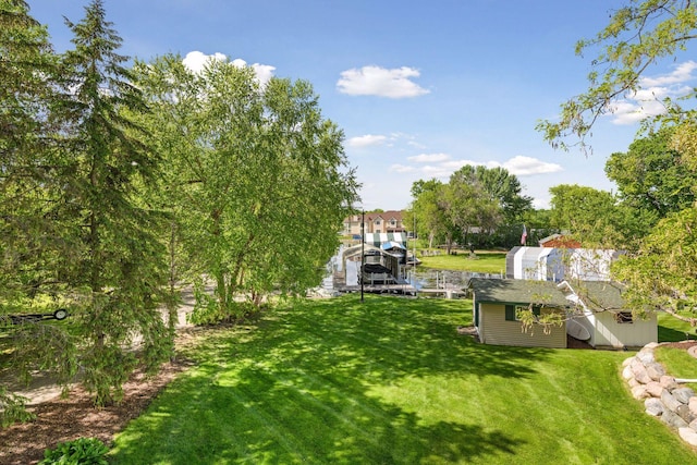 3806 Sunset Dr, Spring Park, MN 55384 - view of green lawn featuring an outdoor structure