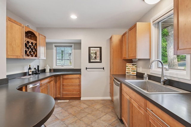 3806 Sunset Dr, Spring Park, MN 55384 - kitchen featuring a sink, dishwasher, dark countertops, baseboards, and recessed lighting