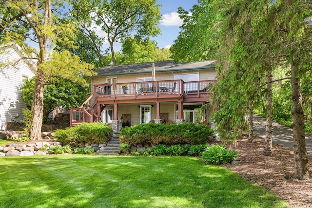 3806 Sunset Dr, Spring Park, MN 55384 - rear view of house with stairs, a deck, and a yard