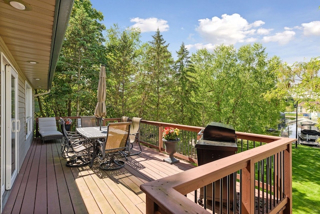 3806 Sunset Dr, Spring Park, MN 55384 - wooden deck featuring outdoor dining area