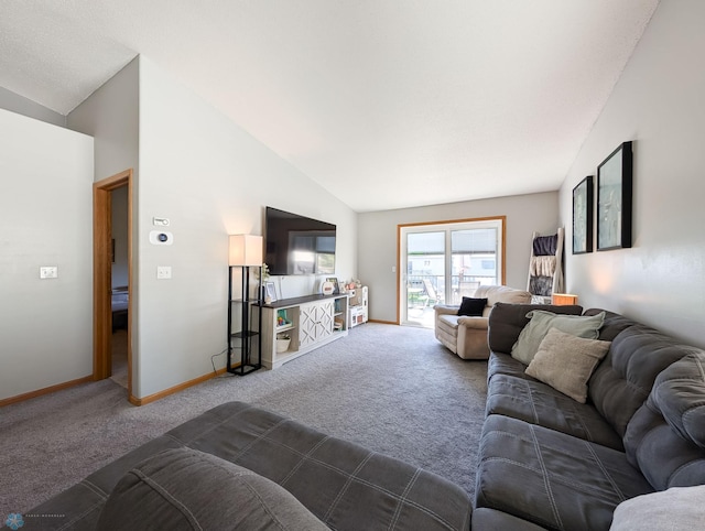 carpeted living room with vaulted ceiling and baseboards