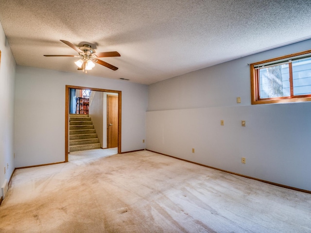 300 27th St NE, Bemidji, MN 56601 - spare room with healthy amount of natural light, light colored carpet, and a textured ceiling
