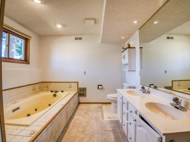 300 27th St NE, Bemidji, MN 56601 - bathroom with a textured ceiling, a jetted tub, toilet, double vanity, and baseboards