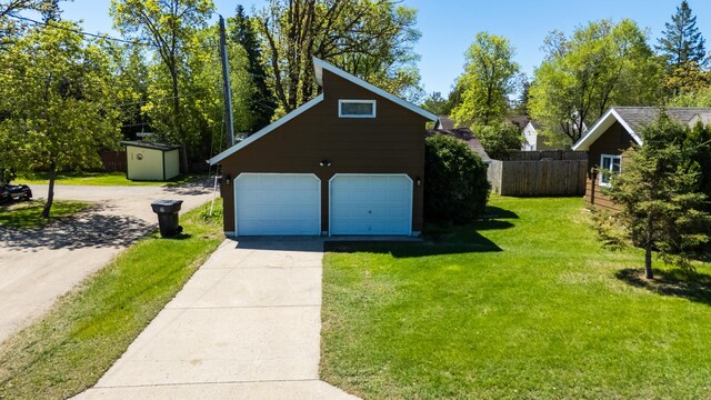 300 27th St NE, Bemidji, MN 56601 - view of front facade featuring an outbuilding and a detached garage