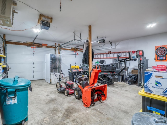 300 27th St NE, Bemidji, MN 56601 - garage with a garage door opener and a heating unit