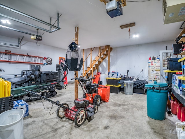 300 27th St NE, Bemidji, MN 56601 - garage featuring a garage door opener and a heating unit