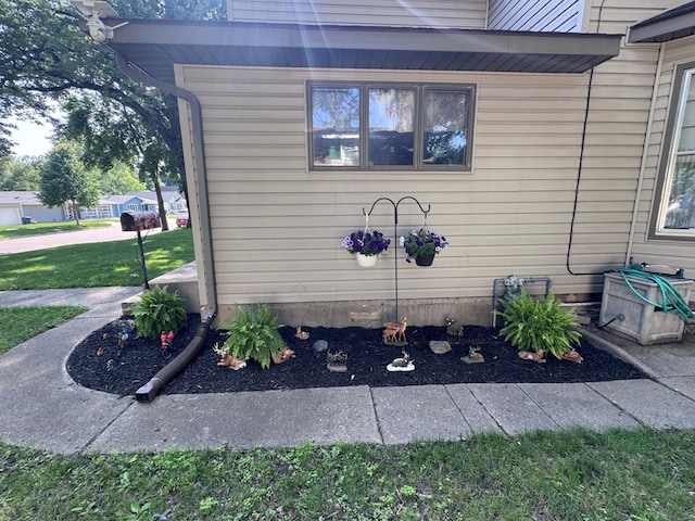 504 Laurel St, Fergus Falls, MN 56537 - view of property exterior with a lawn