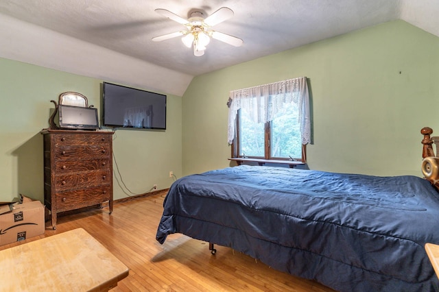 504 Laurel St, Fergus Falls, MN 56537 - bedroom featuring vaulted ceiling, light wood finished floors, and ceiling fan