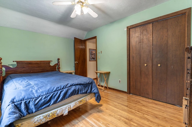 504 Laurel St, Fergus Falls, MN 56537 - bedroom with vaulted ceiling, light wood-style floors, ceiling fan, and a closet