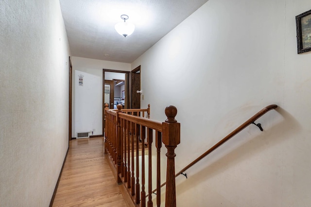504 Laurel St, Fergus Falls, MN 56537 - hall featuring an upstairs landing and light wood-style floors
