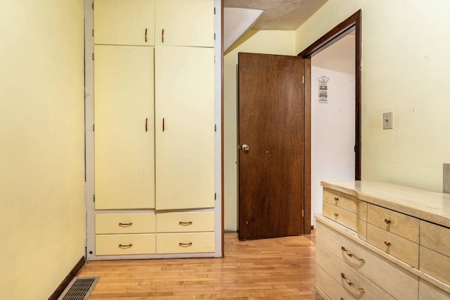 504 Laurel St, Fergus Falls, MN 56537 - bedroom featuring light wood-type flooring and a closet