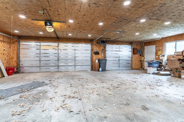 504 Laurel St, Fergus Falls, MN 56537 - garage featuring recessed lighting and a garage door opener