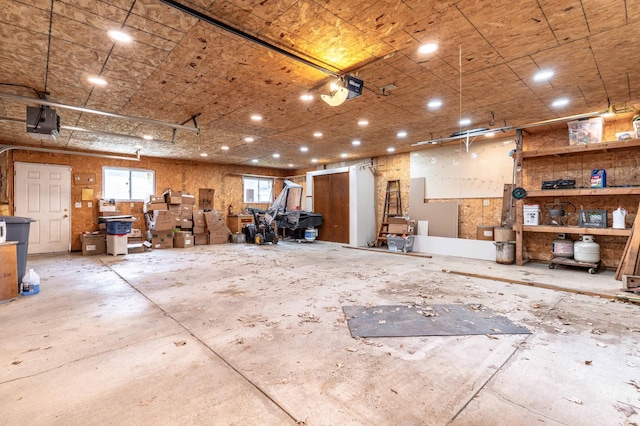 504 Laurel St, Fergus Falls, MN 56537 - garage featuring a garage door opener