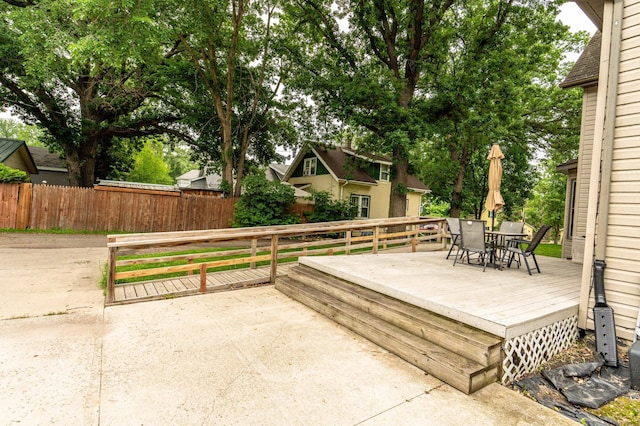 504 Laurel St, Fergus Falls, MN 56537 - wooden deck with outdoor dining space