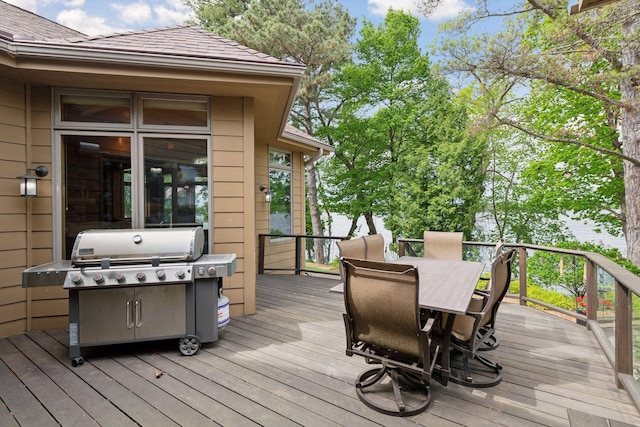 21273 Floral Bay Dr N, Forest Lake, MN 55025 - deck with outdoor dining area and a grill