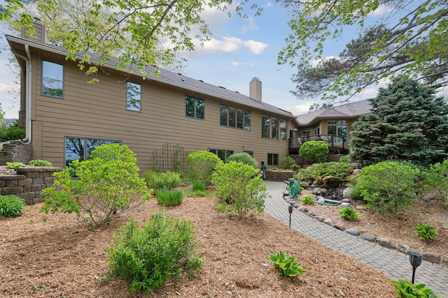 21273 Floral Bay Dr N, Forest Lake, MN 55025 - rear view of house with a chimney