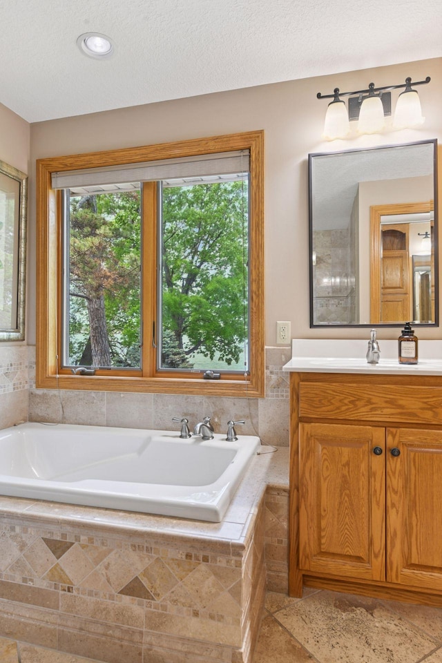 21273 Floral Bay Dr N, Forest Lake, MN 55025 - bathroom featuring vanity and a garden tub
