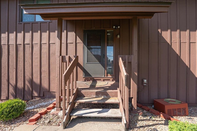 6900 Unity Ave N, Brooklyn Center, MN 55429 - property entrance with board and batten siding