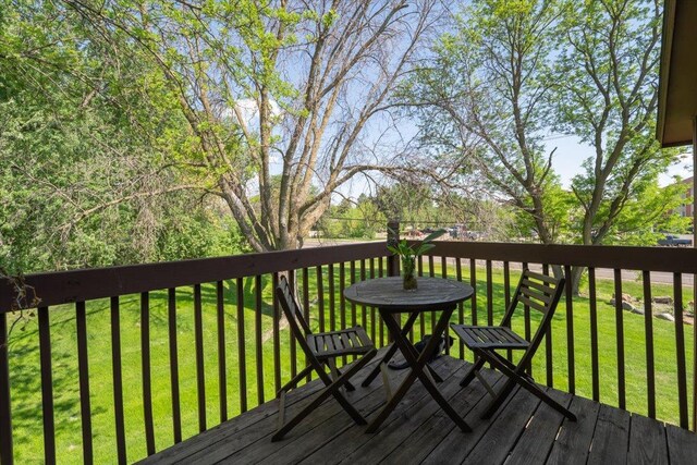 6900 Unity Ave N, Brooklyn Center, MN 55429 - deck featuring a lawn