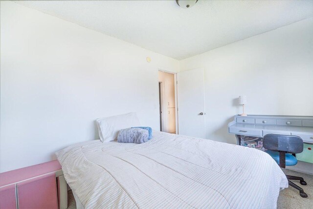 6900 Unity Ave N, Brooklyn Center, MN 55429 - bedroom featuring carpet floors
